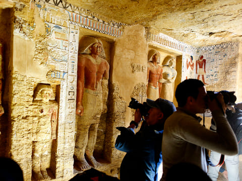 Photographers film inside the recently uncovered tomb of the Priest royal Purification during the reign of King Nefer Ir-Ka-Re, named "Wahtye", at the site of the step pyramid of Saqqara, in Giza, Egypt