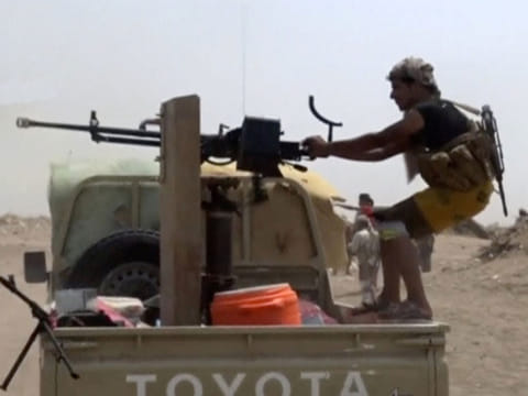 Shots are fired from a vehicle during heavy fighting between the Yemeni government and Houthis in Hodeidah, Yemen, in this still image taken from video obtained on December 18, 2018. 