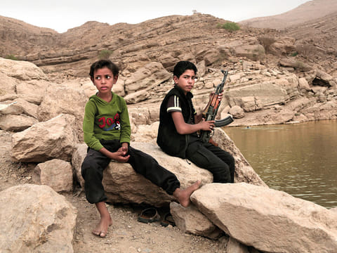 A 17-year-old boy with his AK-47 in High Dam in Marib. Experts say child soldiers are “the firewood” in the inferno of Yemen’s civil war, trained to fight, kill and die on the frontlines.