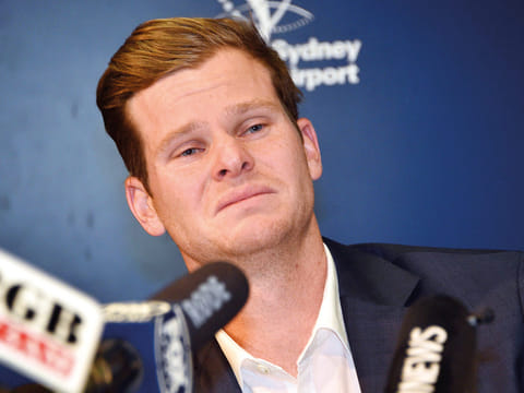Steve Smith cries during a press conference in Sydney after the ball-tampering scandal. Smith and Warner were slapped with lengthy bans for their act.