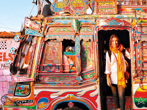 Eva Zu Beck in a vehicle decorated with Pakistan's 'truck art'