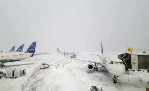 Thousands of flights were delayed or cancelled due to a winter storm in the US.