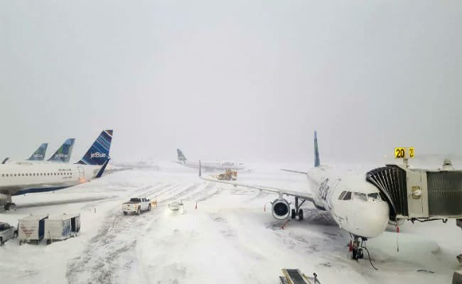 Thousands of flights delayed as storm rages in the US East Coast. 