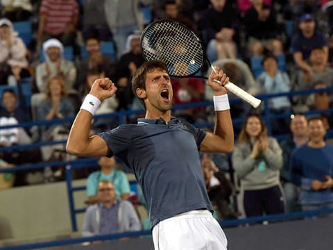 Novak Djokovic, winner of Mubadala World Tennis Championship, celebrating after he won against Kevin Anderson before the trophy presentation ceremony at Abu Dhabi International Tennis Center on Saturday. 