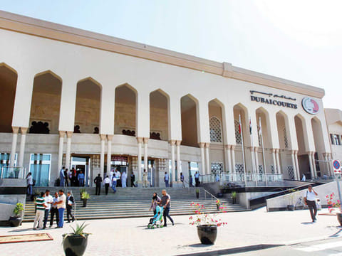 The main facade of Dubai Courts building.