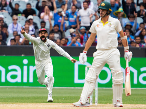 India's Virat Kohli and Australia's Pat Cummins 