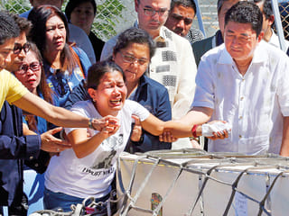 Family grieves Philippine maid found dead in Kuwait freezer