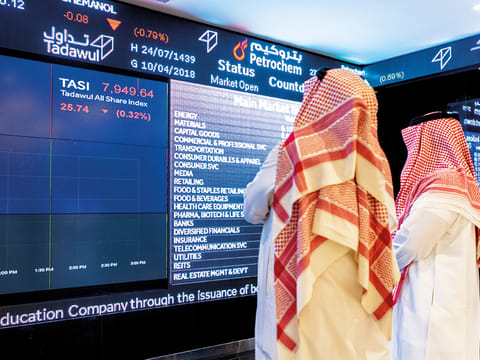 Stock price information displayed in the Saudi Stock Exchange, also known as the Tadawul, in Riyadh. Asset management industry in the GCC countries are expected to face pressure on their profitability this year from COVID-related economic contraction, low oil prices and geopolitical uncertainties.
