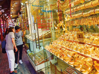 Gold prices dip as rallying stocks boost risk appetite