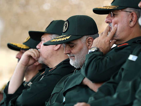 Gen. Qassem Soleimani (center), headed the Quds Force of Iran's Revolutionary Guard