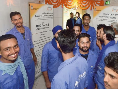 Indian workers at the opening of the Indian Workers Resource Centre (now called Pravasi Bharatiya Sahayata Kendra) in 2017.