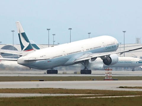 A Cathay Pacific plane takes off at Hong Kong airport.