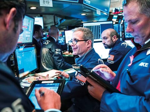 Traders at the New York Stock Exchange.