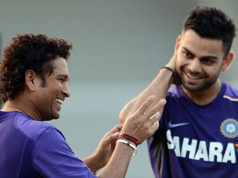 Sachin Tendulkar with Virat Kohli. 