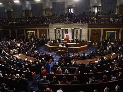 Members of Congress as Incoming Speaker of the House Nancy Pelosi speaks during the opening session of the 116th Congress at the US Capitol in Washington, DC, January 3, 2019.