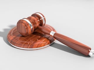 Driver on trial for assaulting woman