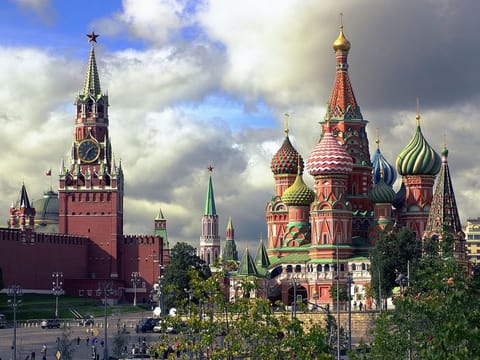 Spasskaya Tower, left, and St Basil's Cathedral in Moscow, Russia.