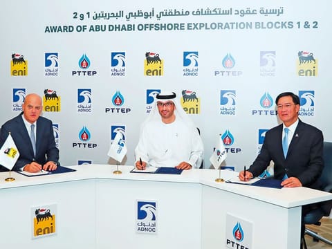 Dr. Sultan Ahmad Al Jaber, UAE Minister of State and Adnoc Group CEO, Claudio Descalzi, CEO of Eni and Phongsthorn Thavisin, President and Chief Executive Officer of PTTEP sign the agreement in Abu Dhabi.