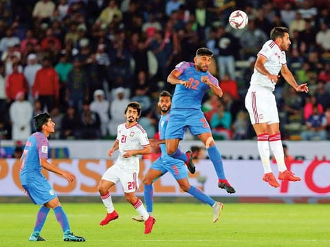 India's defender Anas Edathodika, second right, heads the ball past United Arab Emirates' forward Ali Mabkhout al Hajeri, right, during the AFC Asian Cup group A soccer match between United Arab Emirates and India at Zayed Sports City Stadium in Abu Dhabi, United Arab Emirates, Thursday, Jan. 10, 2019.