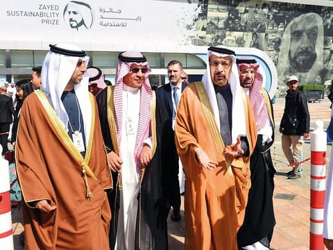 UAE Minister of Energy and Industry Suhail Mohammad Al Mazroui (left), Saudi Arabia’s Minister of Energy Khalid Al Falih (third from left) and other senior officials tour the pavilions after the opening of Abu Dhabi Sustainability Week at Adnec on Monday.