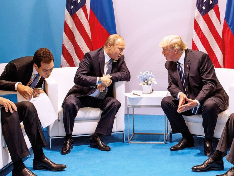 President  Donald Trump meets with Russian President Vladimir Putin