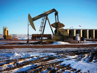 Oil crawls back up on signs of firm US fuel demand, weaker dollar