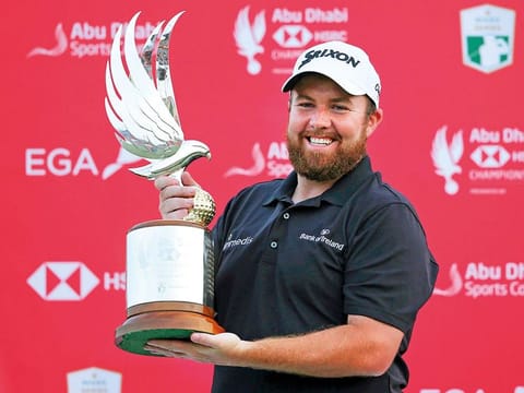 Shane Lowry holds the trophy after winning the Abu Dhabi HSBC Championship at the Abu Dhabi Golf Club