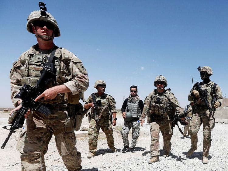 US troops patrol at an Afghan National Army
