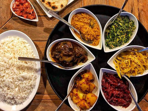 A typical traditional Sri Lankan plate offers a good balance of food groups, with a lot of plant-based dishes and a serving of fish 