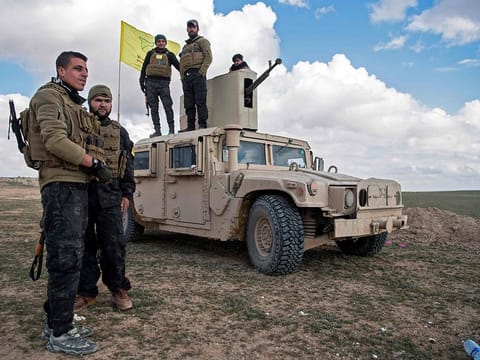 US-backed Syrian Democratic Forces (SDF) fighters gather as they prepare to expel hundreds of the Daesh jihadists from the Baghouz area in the eastern Syrian province of Deir Ezzor 