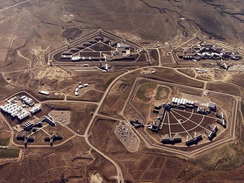 This Feb. 11, 2004, file photo provided by the Bureau of Prisons shows the Federal Correctional Complex in Florence, Colo. Clockwise from lower left is the minimum security Federal Prison Camp, the high security United States Penitentiary, the maximum security United States Penitentiary and the Federal Correctional Institution. 