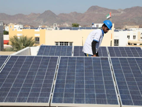 Solar panels installed on the roofs of villas in Hatta.