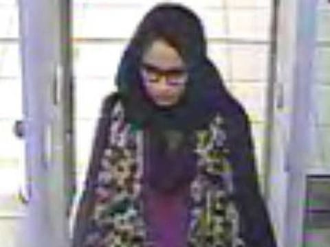 In this file handout photo taken on February 17, 2015 a video grab taken from CCTV, received from the Metropolitan Police Service (MPS) on February 23, 2015, shows Shamima Begum passing through security barriers at Gatwick Airport, south of London. 