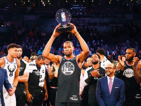 Kevin Durant #35 of the Golden State Warriors and Team LeBron celebrates with the MVP trophy after their 178-164 win over Team Giannis during the NBA All-Star game as part of the 2019 NBA All-Star Weekend at Spectrum Center on February 17, 2019 in Charlotte, North Carolina. 