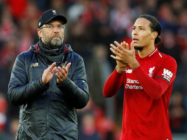 Liverpool manager Juergen Klopp and Liverpool's Virgil van Dijk
