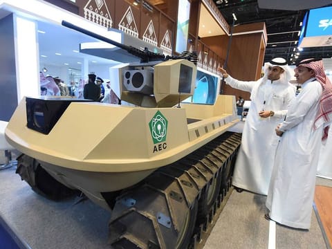 The visitors look at 'UGV' unmanned vehicle at IDEX 2019 Saudi pavilion. Saudi Arabia will invest more than $20 billion in its domestic military industry over the next decade as part of aggressive plans to boost local military spending.