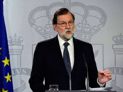In this file photo taken on October 01, 2017 Spanish Prime Minister Mariano Rajoy speaks during a press conference at La Moncloa palace in Madrid, following a referendum on independence for Catalonia banned by Madrid.