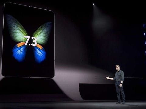 Justin Denison, senior vice president of mobile product marketing for Samsung Electronics Co., speaks during the Samsung Unpacked launch event in San Francisco, California, U.S. on Wednesday, Feb. 20, 2019. Samsung debuted its most extensive new lineup of smartphones, taking on Apple Inc. amid a slowing market with new low-end and premium models, 3-D cameras, an in-screen fingerprint scanner and faster 5G connectivity. 