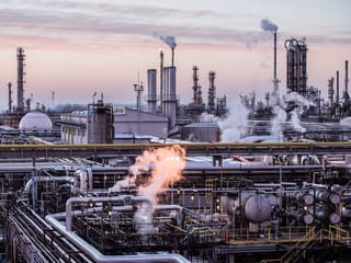 Oil settles up $2 on tighter supply; OPEC+ talks limit gains  