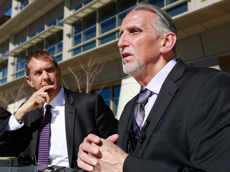 Craig Coley, right, talks to press 20190215