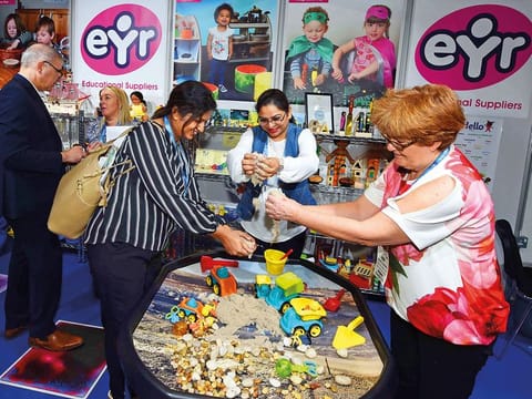 Visitors tring the Kinetic sand from Early Year Resources during the 12th Global Education Forum and the Global Education Supplies and Solution Exhibition 2019 at Dubai World Trade Center.