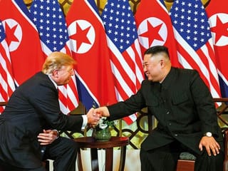 Trump, Kim handshake kicks off nuclear summit