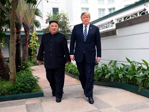 Kim Jong-un, North Korea's leader, walks with President Donald Trump on Thursday morning, Feb. 28, 2019, at the Metropole Hotel in Hanoi, Vietnam, before their meeting.