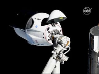 SpaceX Dragon capsule successfully docks with ISS