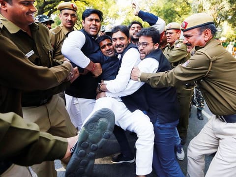 Police detain activists of the Delhi Pradesh Youth Congress demanding resignations of Narendra Modi, and Defence Minister, Nirmala Sitharaman, over allegations of corruption in the  Rafale deal.