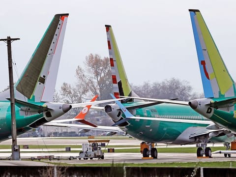 In this Nov. 14, 2018, file photo Boeing 737 MAX 8 planes are parked near Boeing Co.'s 737 assembly facility in Renton, Washington. China on Monday ordered domestic airlines to suspend commercial operation of the Boeing 737 MAX 8, citing the Ethiopian Airlines crash and another deadly accident of that same model in Indonesia.