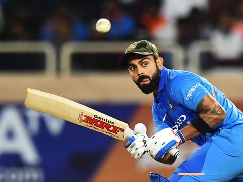 Indian cricketer captain Virat Kohli plays a shot during the third one-day international (ODI) cricket match between India and Australia at the Jharkhand State Cricket Association International Cricket Stadium, in Ranchi.