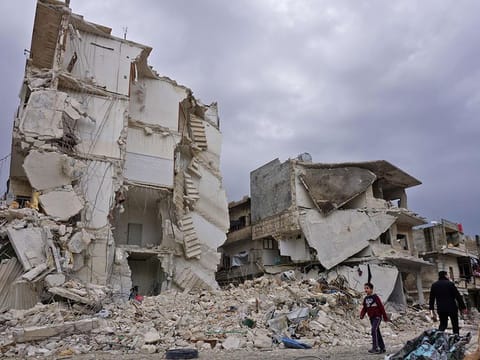 Destructions following an airstrike in the jihadist-held city of Idlib, northwestern Syria. Russian air strikes killed at least 13 civilians, including six children, on March 14 in Idlib province, in the first such raids since a September truce deal, a monitor said.