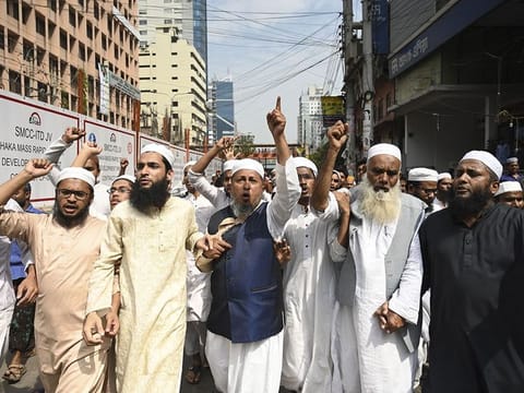 Bangladeshi Muslims protest after two mosques have been attacked in New Zealand following Friday prayers, in Dhaka on March 15, 2019. 