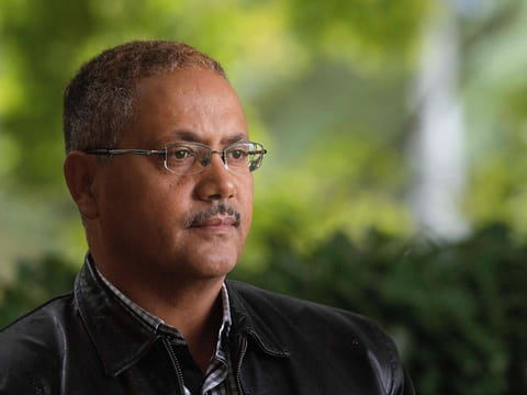 Abdul Kadir Ababora an Ethiopian living in New Zealand and who was in the Dean Street mosque when worshipers were gunned down on March 15, poses in Christchurch
